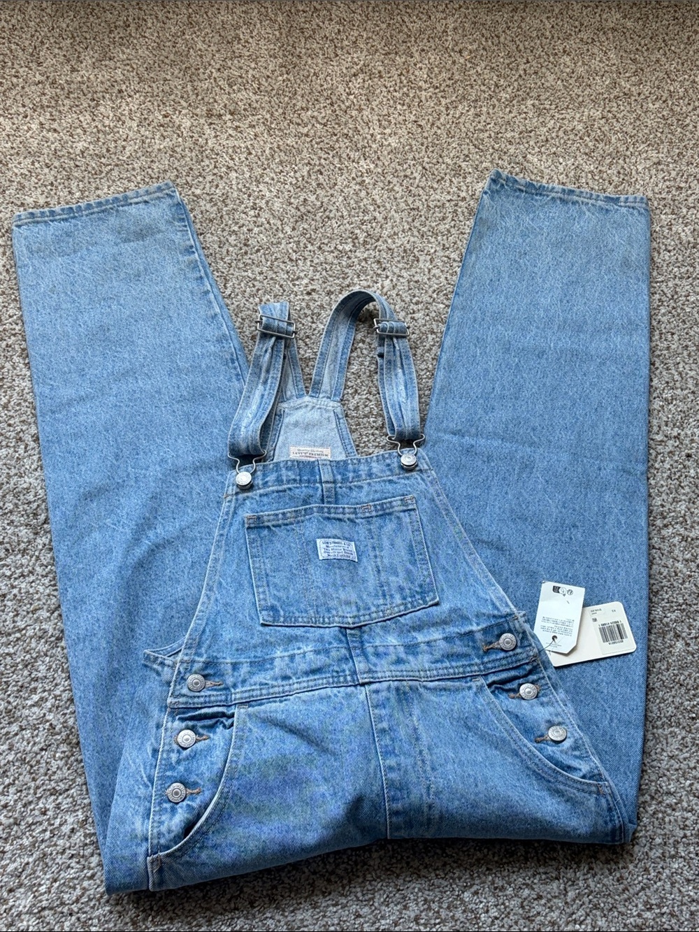 Levi's brand denim overalls in a women's size Extra Small (XS)